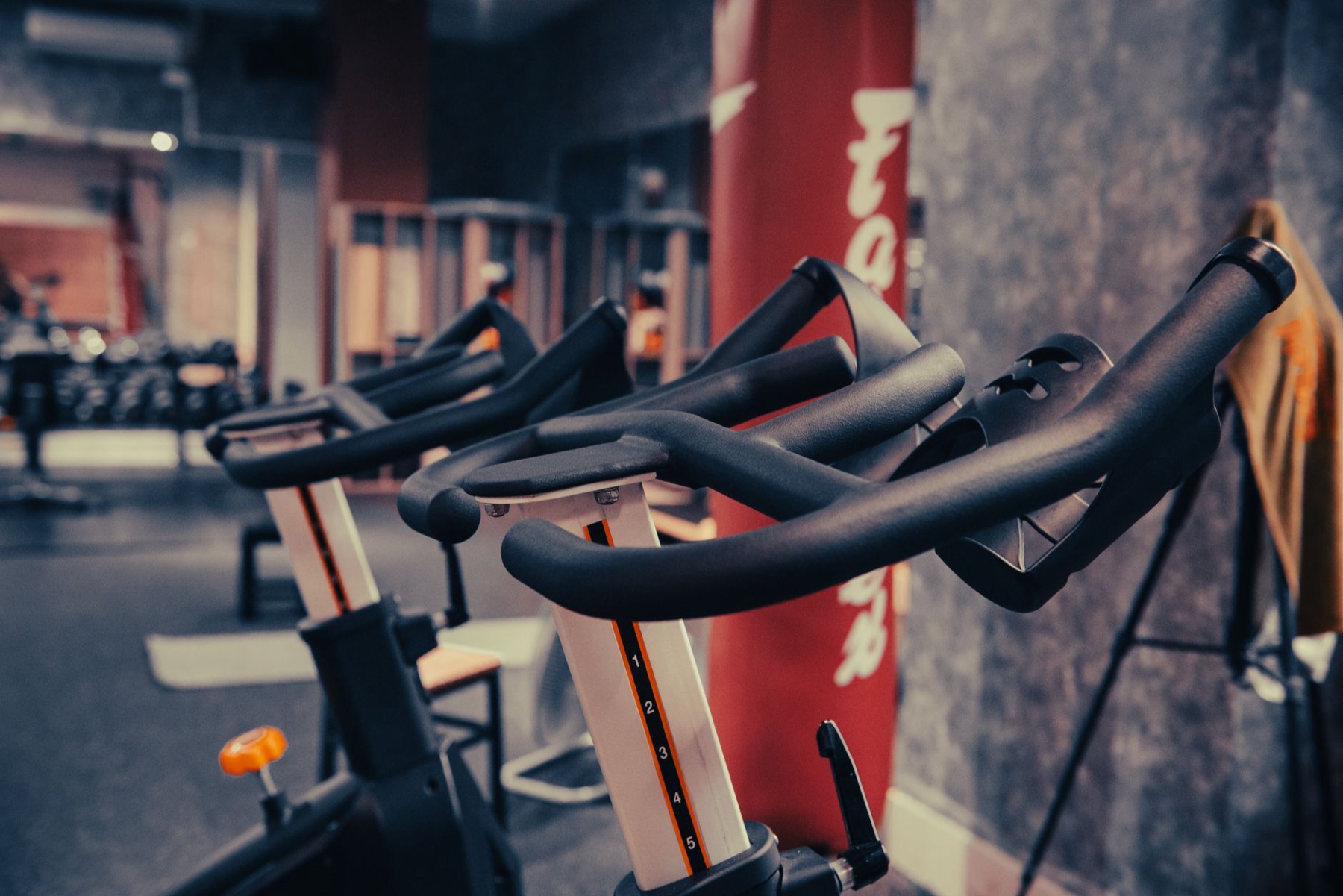 Athletes training in a bright fitness studio